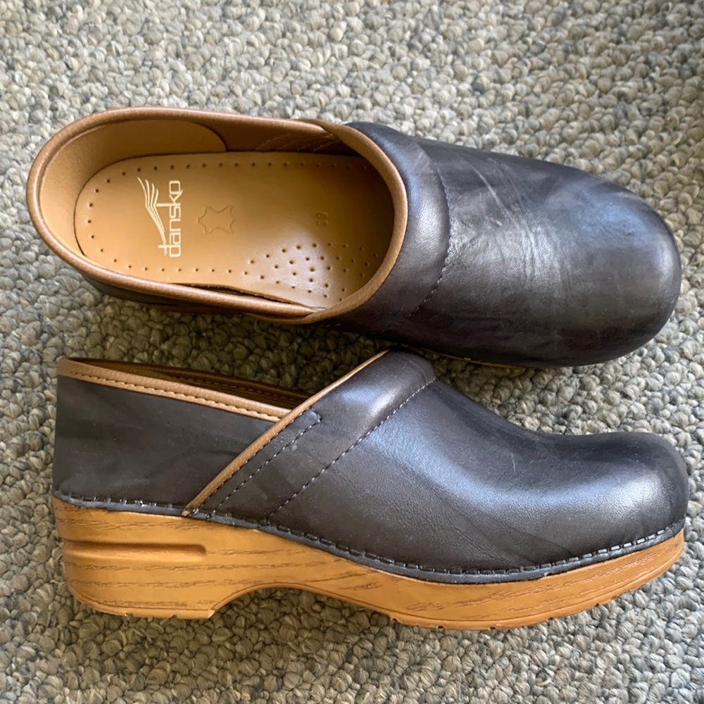 Never worn Dansko Clogs